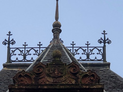 AT’s initials on pediment head with original brattishings and finials